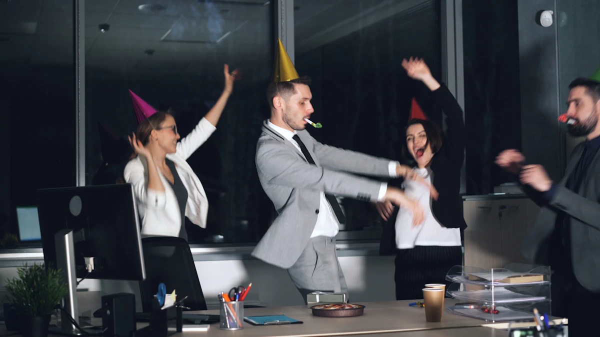 Colleagues celebrating and dancing together at an office party
