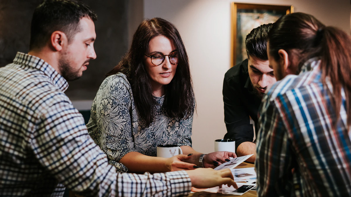 Colleagues reviewing documents together during a workplace discussion