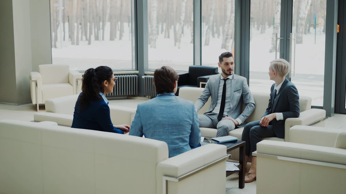Four professionals in a calm discussion during a mental health workshop